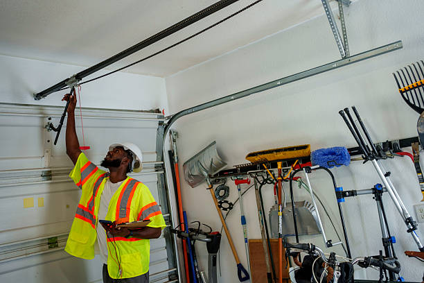 Professional Garage Door technician working in Depoe Bay, OR